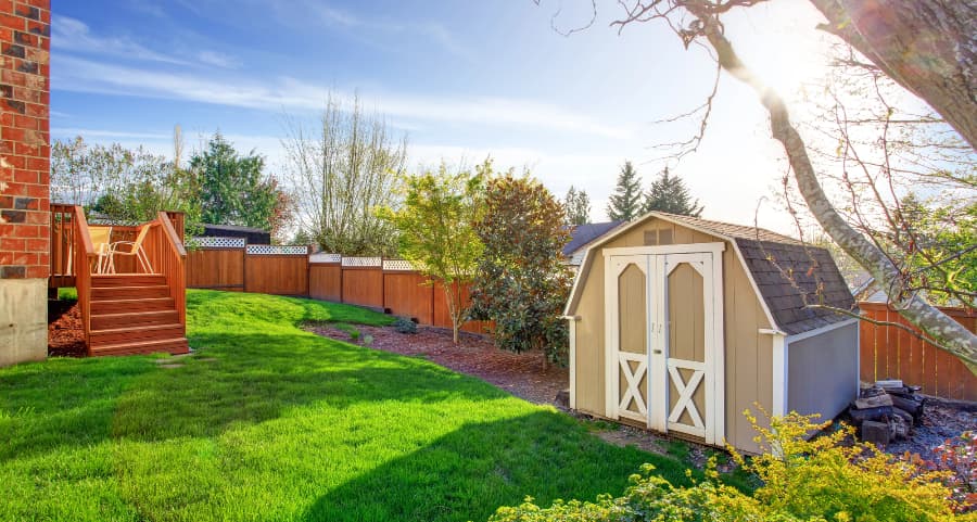 Fenced backyard with storage shed in Atlanta